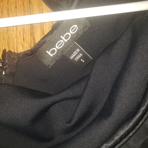 Bebe LBD layered neckline Size Small bodycon dress with slimming design - Picture 11 of 11